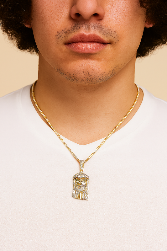 Man wearing a gold necklace with a lion pendant on a beige background