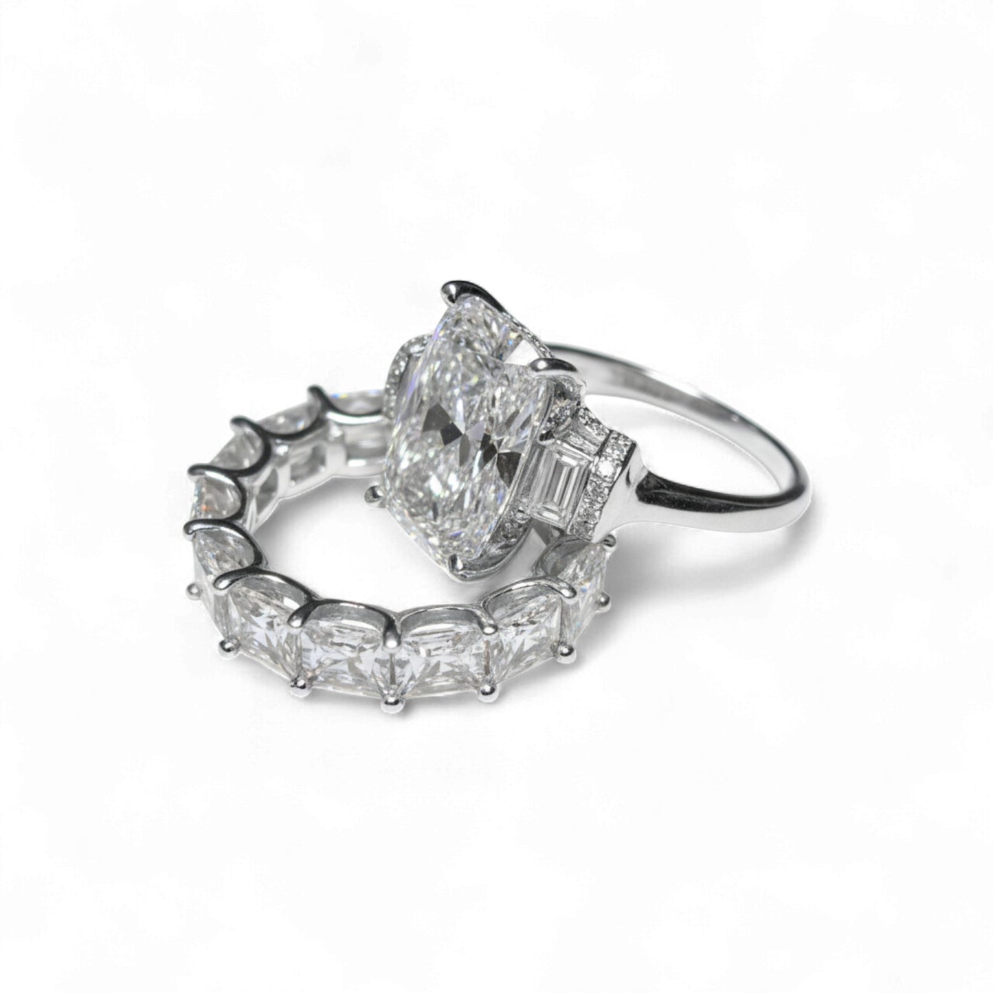 Two diamond rings on a white background