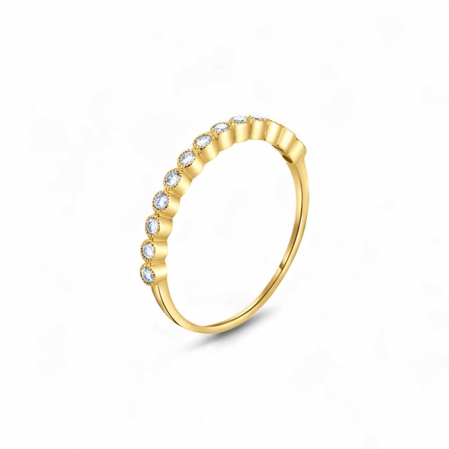 Gold ring with small diamonds on a white background