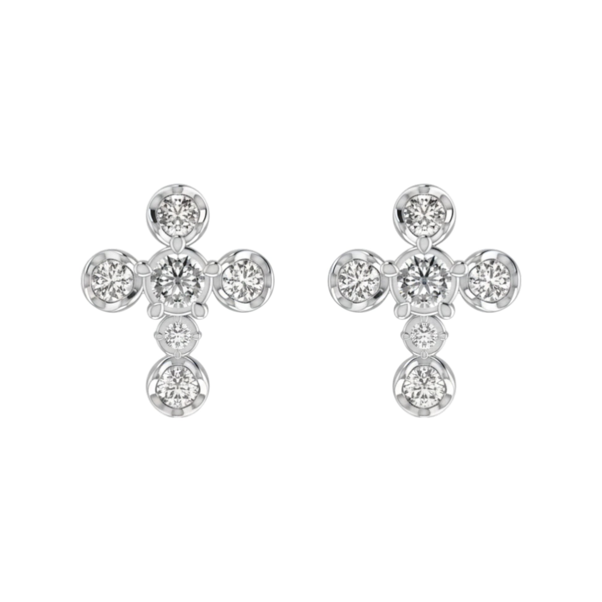 Pair of silver cross-shaped earrings with clear gemstones on a white background