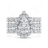 Diamond ring with a pear-shaped center stone on a white background