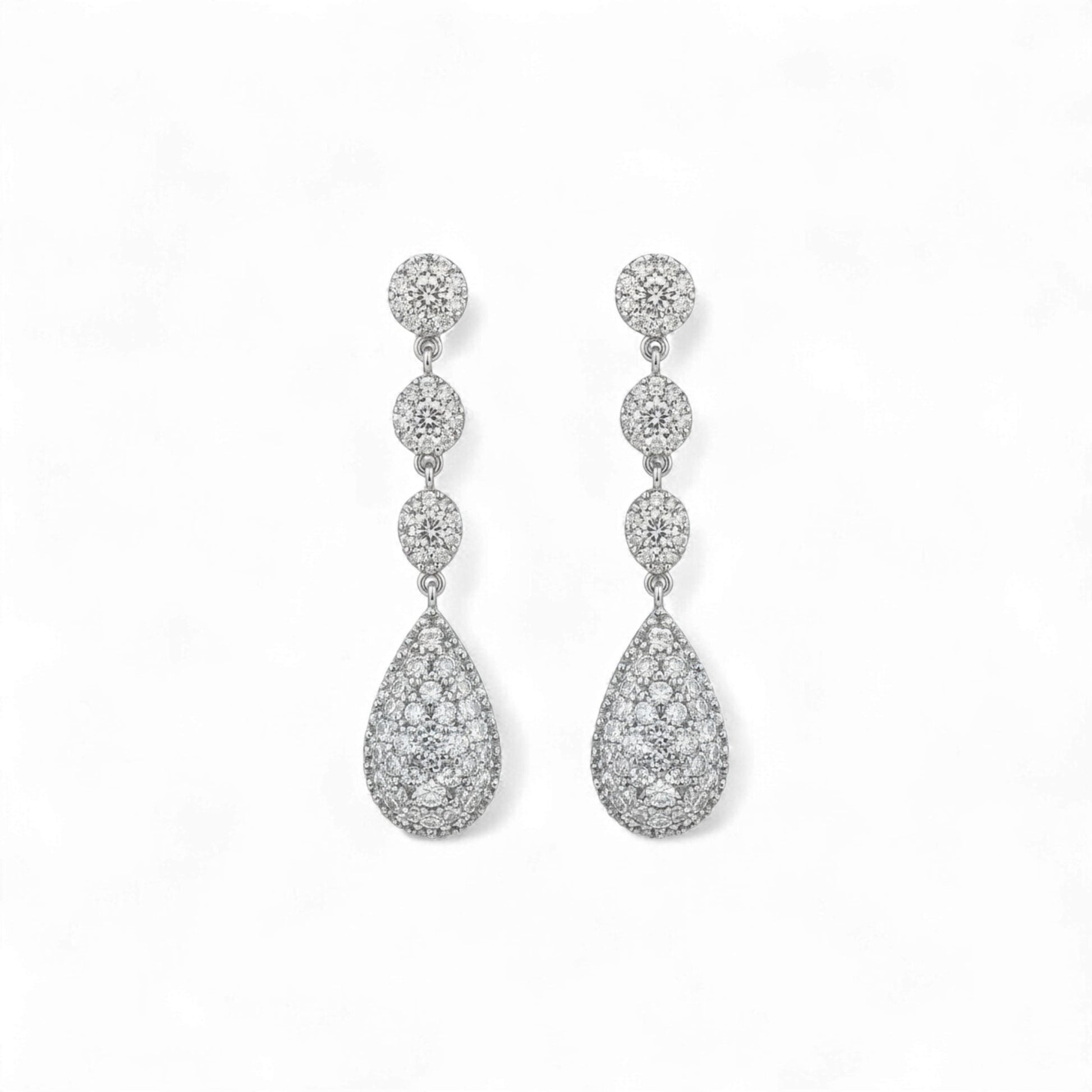 Pair of diamond earrings on a white background