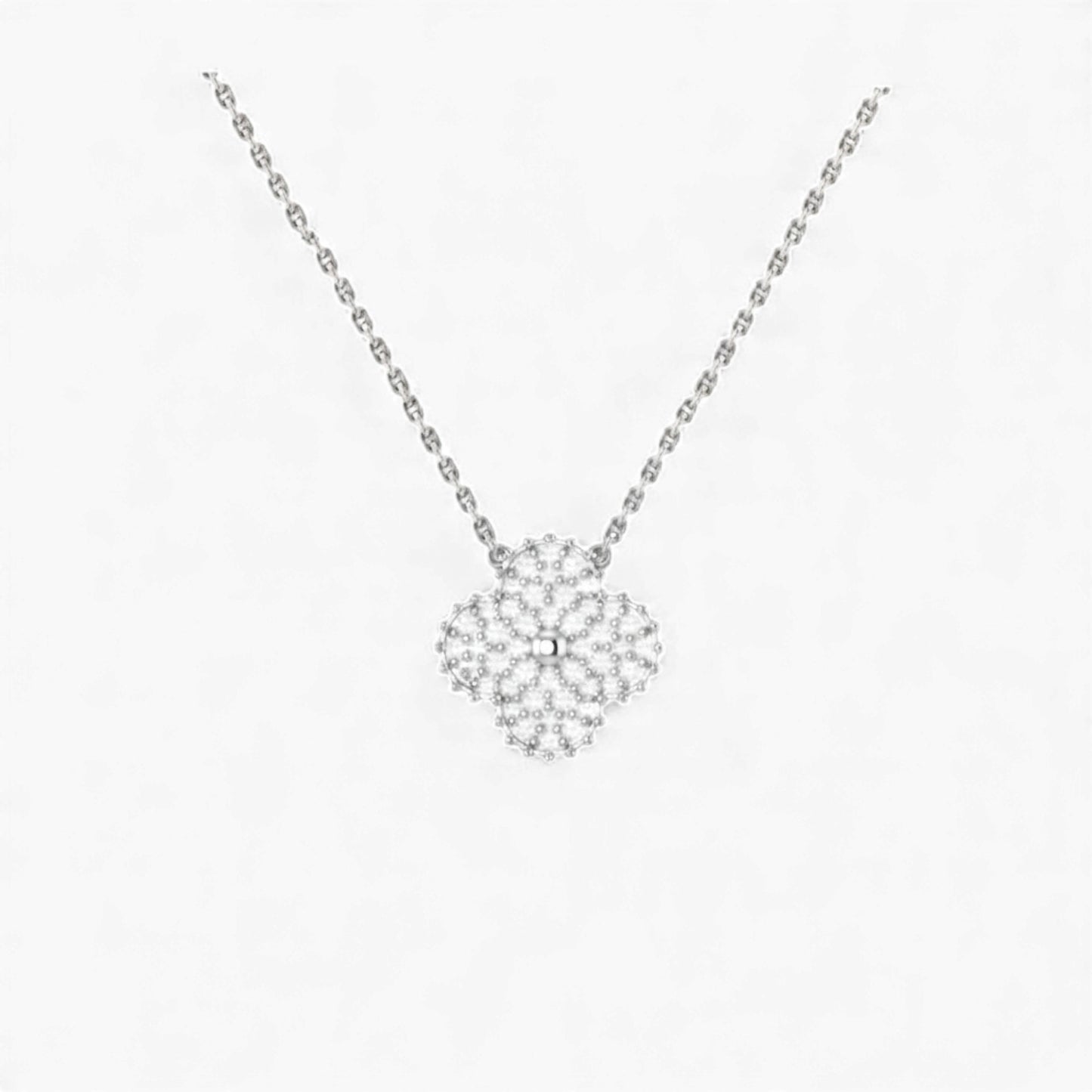 Silver necklace with a floral pendant on a white background