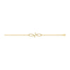Gold bracelet with a bow charm on a white background