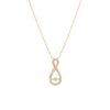 Gold necklace with a diamond pendant on a white background