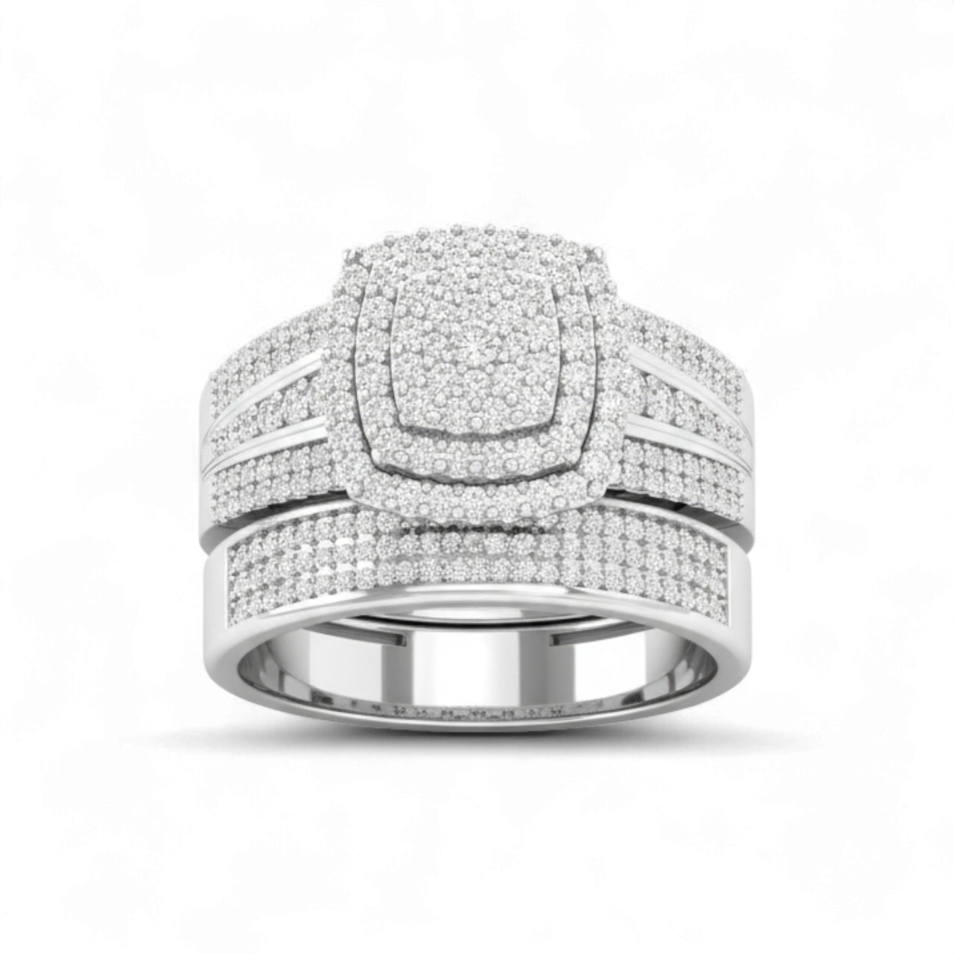 Silver ring with multiple bands and diamond accents on a white background