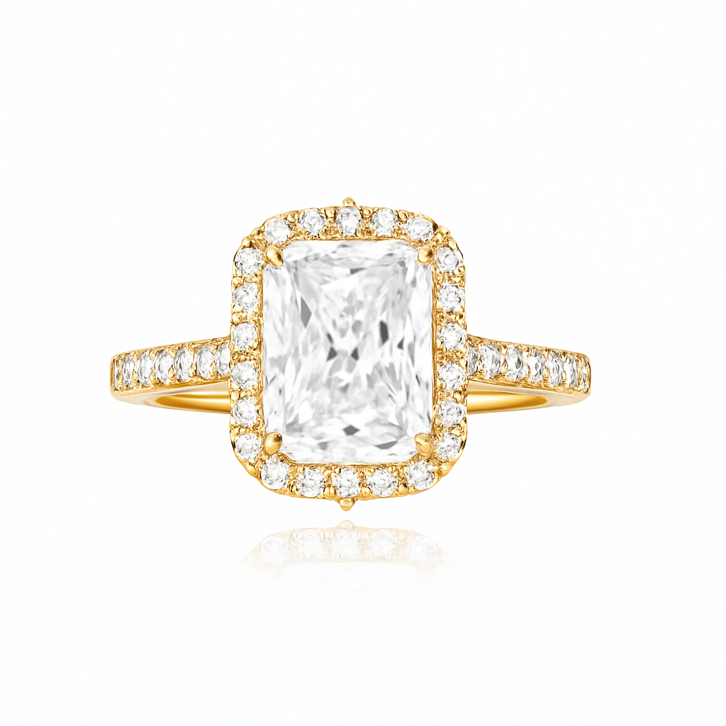 Gold ring with a large central diamond and smaller diamonds around on a white background
