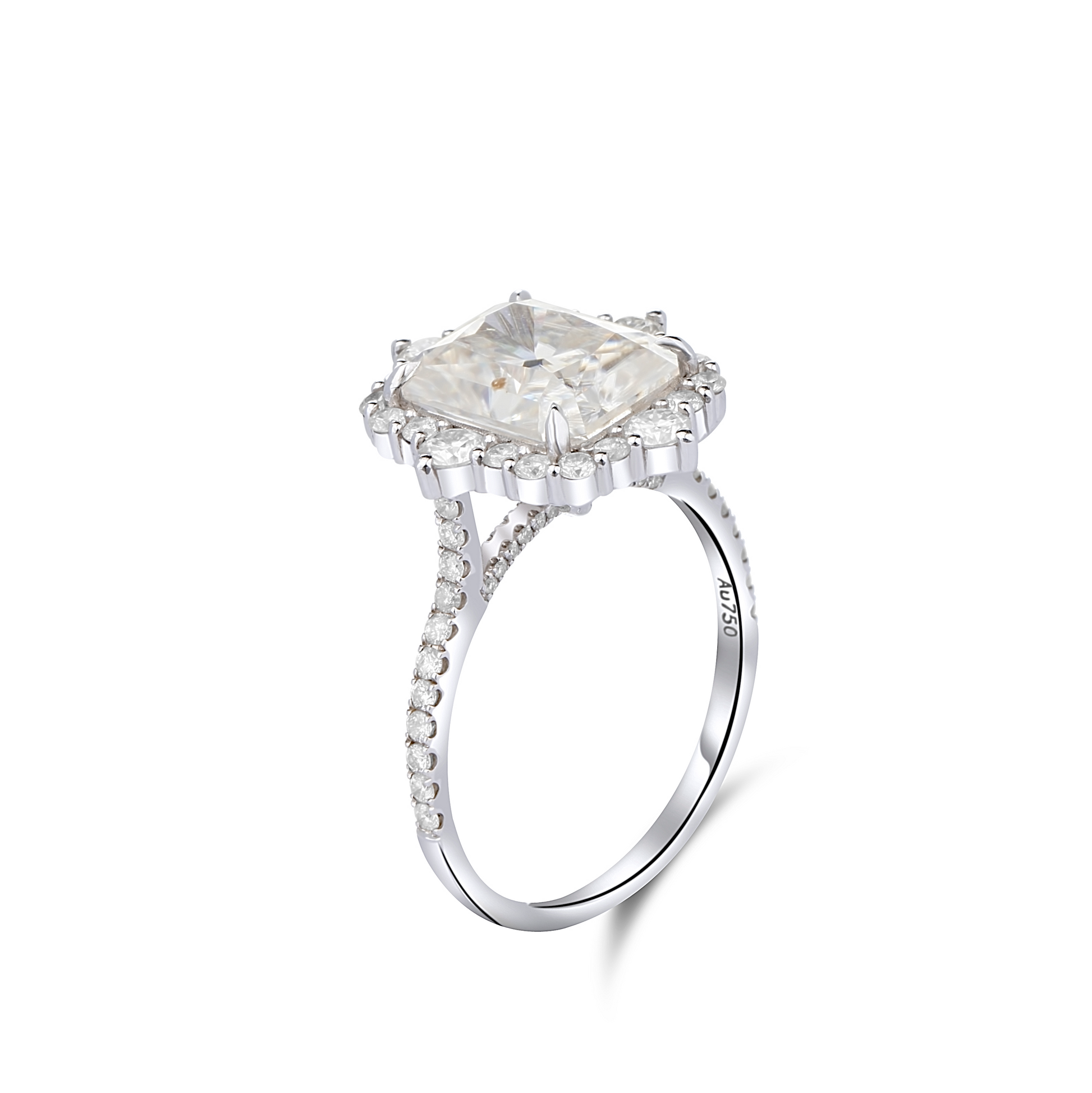 Silver ring with a large diamond and smaller diamonds on the band against a white background