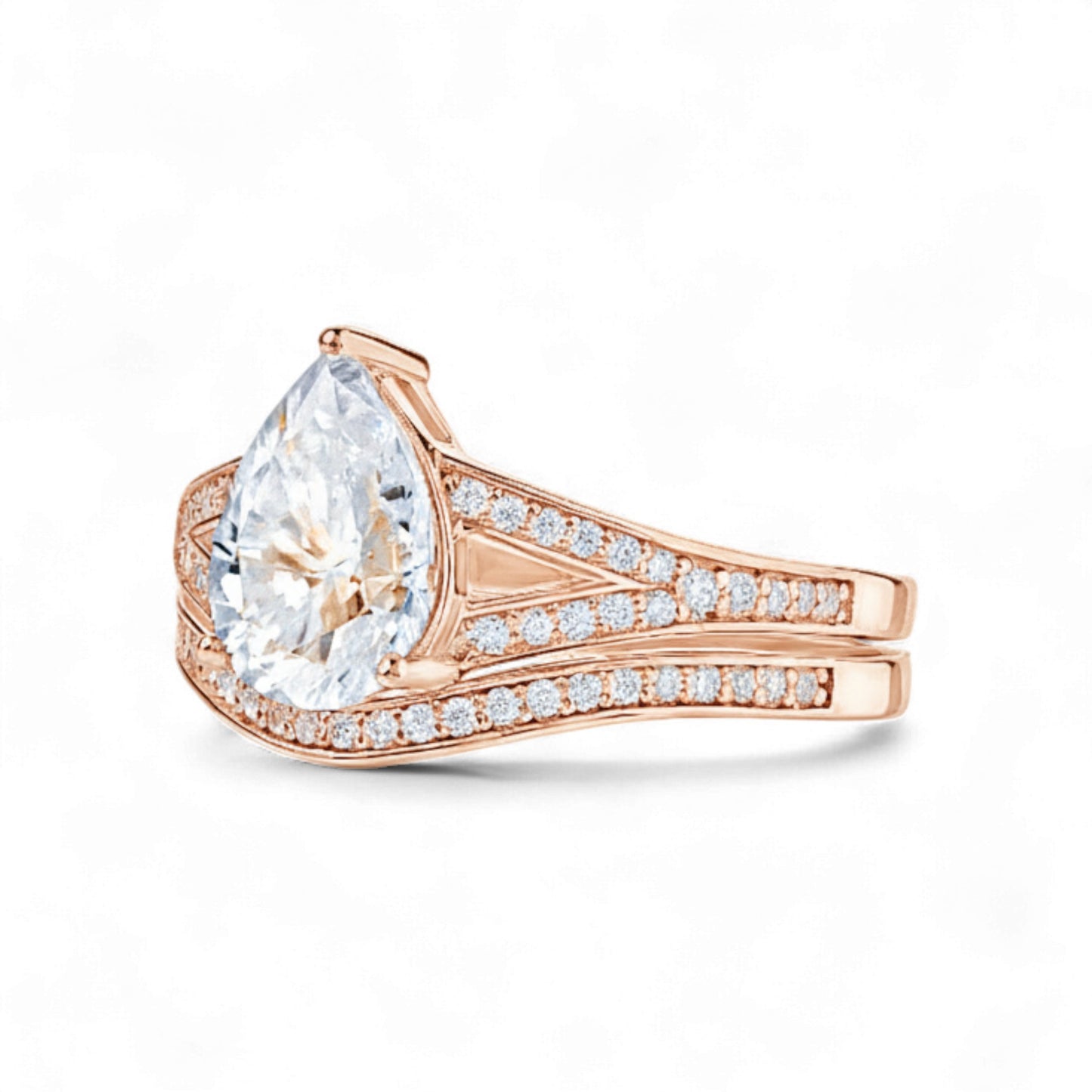 Rose gold ring with a large diamond and smaller diamonds on the band against a white background