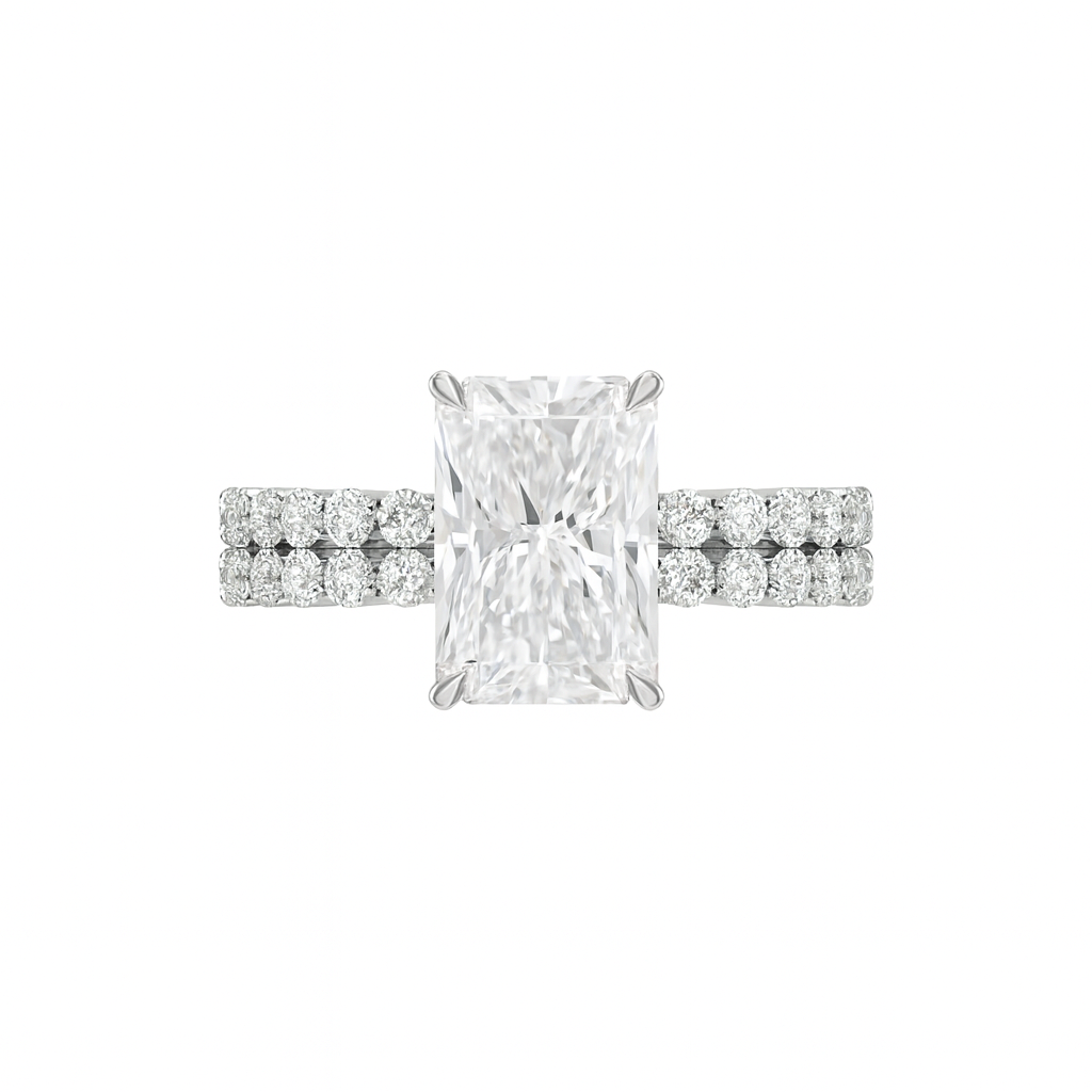 Diamond ring with a rectangular center stone and smaller round stones on a white background