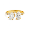 Gold ring with two large pear-shaped diamonds on a white background