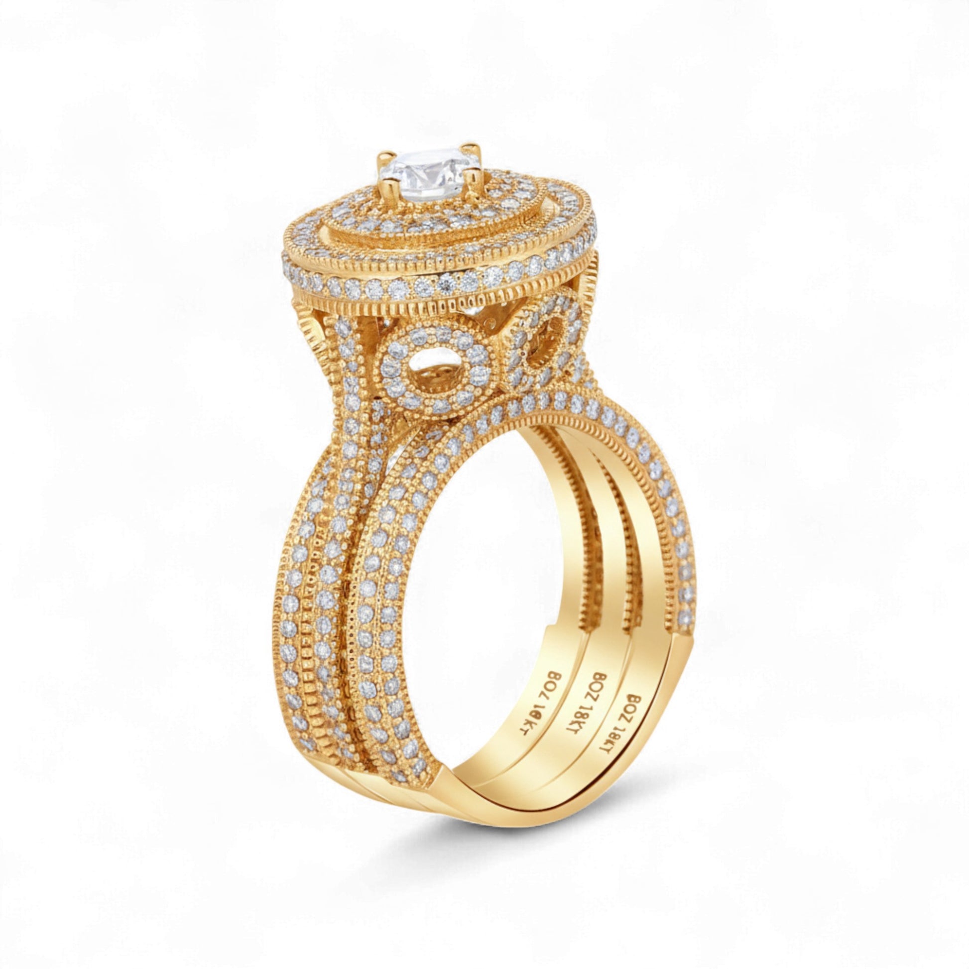 Gold ring with diamond accents on a white background