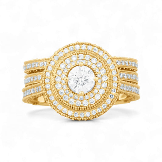 Gold ring with diamond accents on a white background