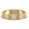 A 18 karat gold band with natural diamonds set around its circumference.