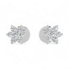 Silver flower-shaped earrings with clear stones on a white background