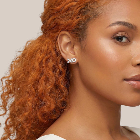 XOXO Natural Diamond Studs in 18KT Gold
