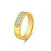 Gold ring with diamond accents on a white background