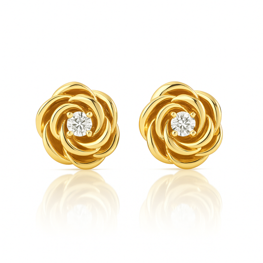 Gold earrings with diamond centers on a white background