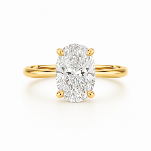 Gold ring with a large diamond on a white background