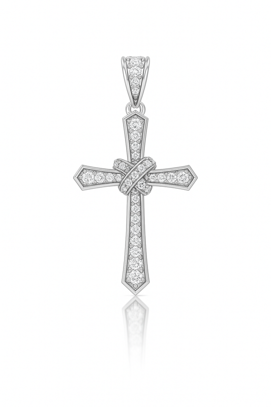 Silver cross pendant with embedded stones on a white background
