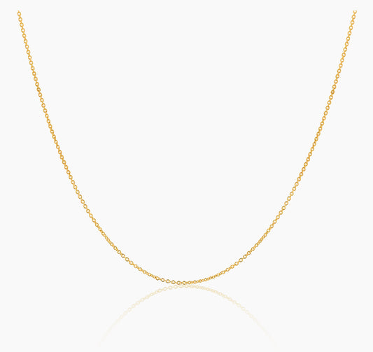 A dainty 18k gold chain necklace displayed against a white background.