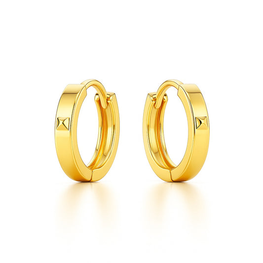 Gold hoop earrings on a white background