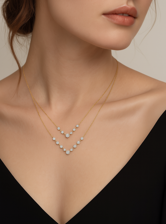 Necklace with heart-shaped pendant worn by a model against a neutral background