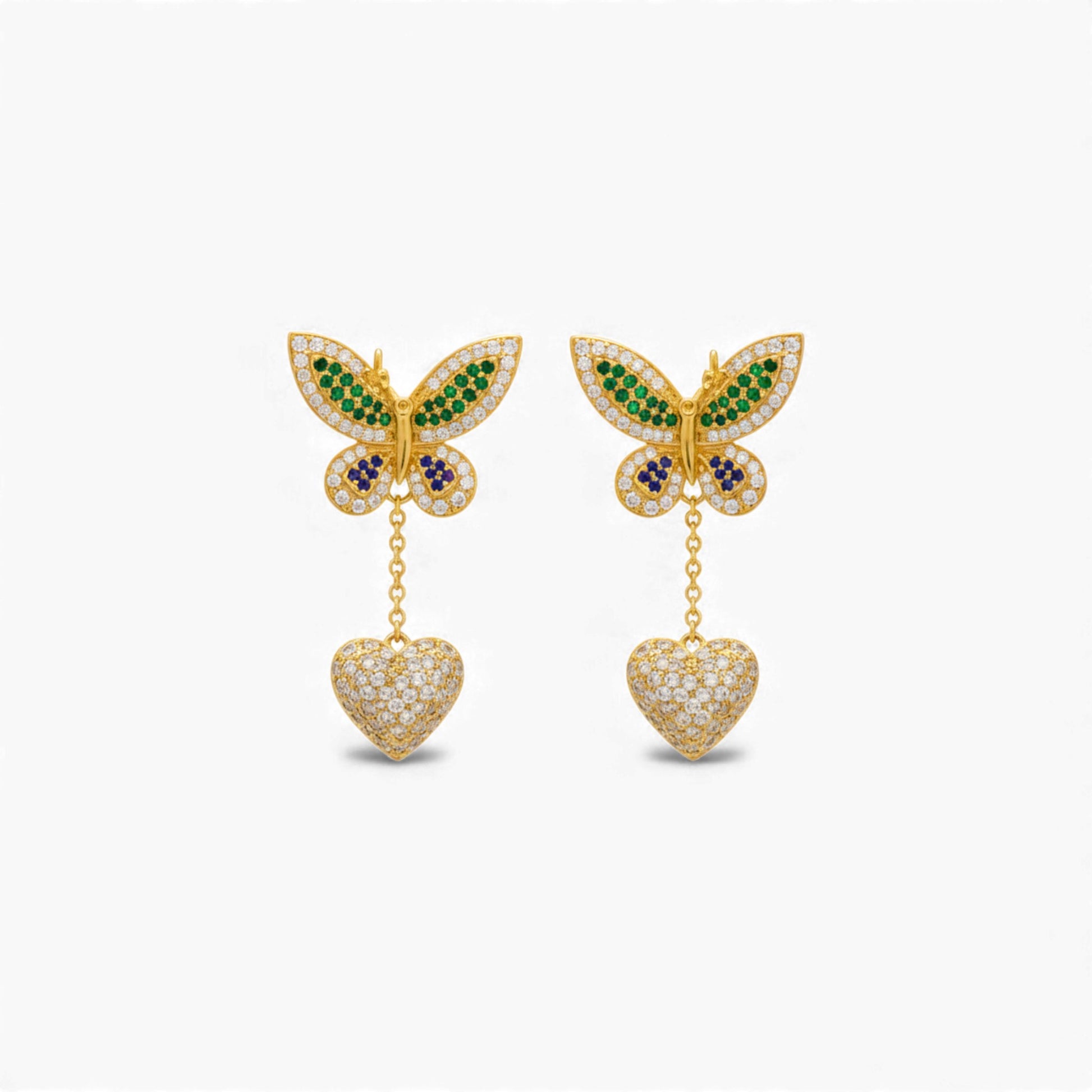 Butterfly earrings with heart pendants on a white background