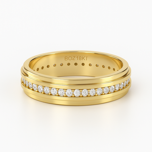 Gold ring with diamond accents on a white background