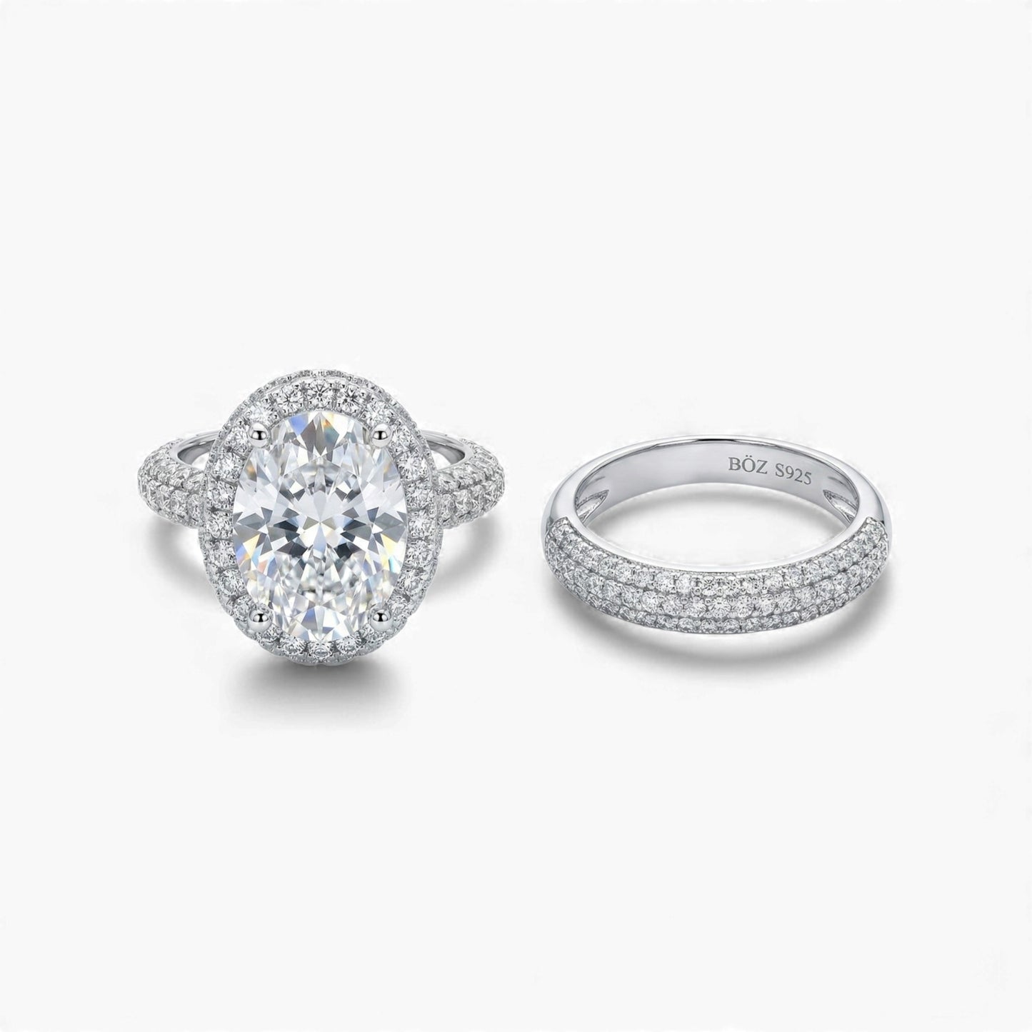 Two diamond rings on a white background