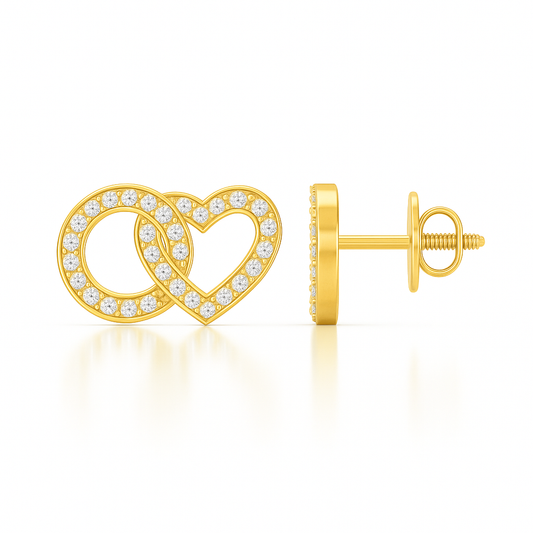 Gold heart-shaped earrings with clear gemstones on a white background