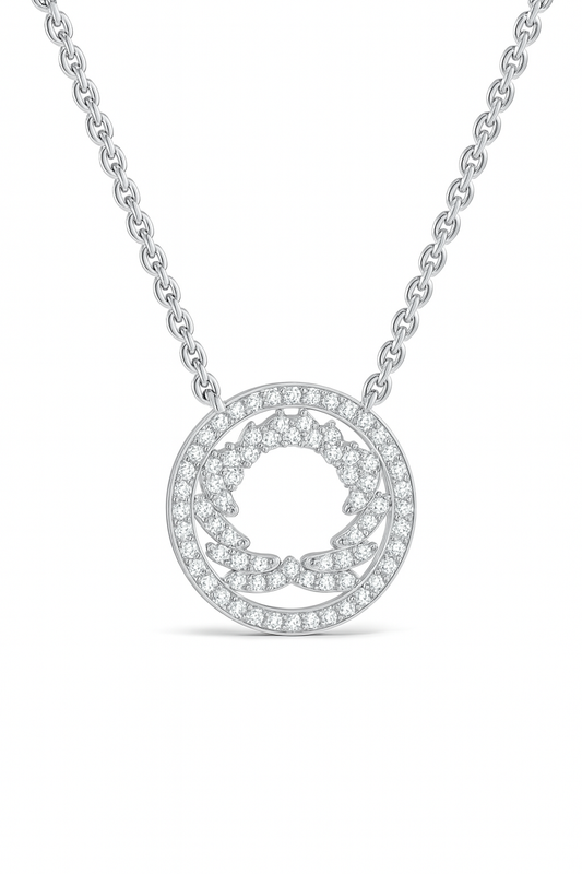Silver necklace with a circular pendant on a white background
