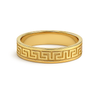 Gold ring with a Greek key design on a white background