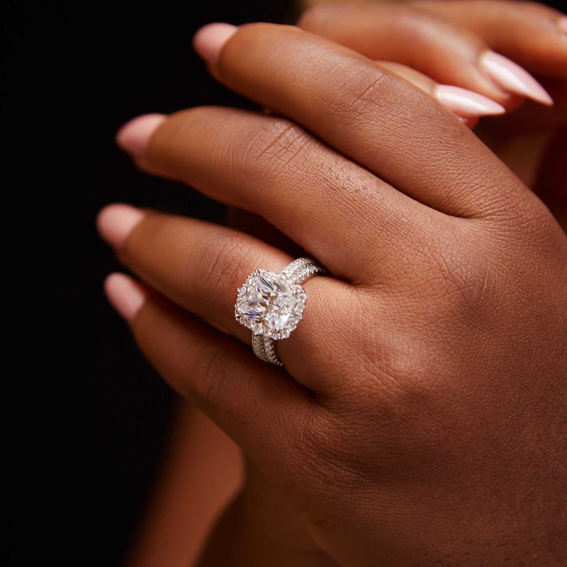 Quinn Radiant Cut CZ sterling silver bridal ring set with radiant-cut cubic zirconia and micro-set accent stones on hand