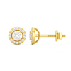 Gold earrings with clear gemstones on a white background