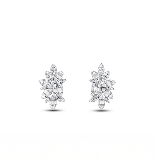 A pair of lyra-shaped diamond stud earrings in 18 karat gold.