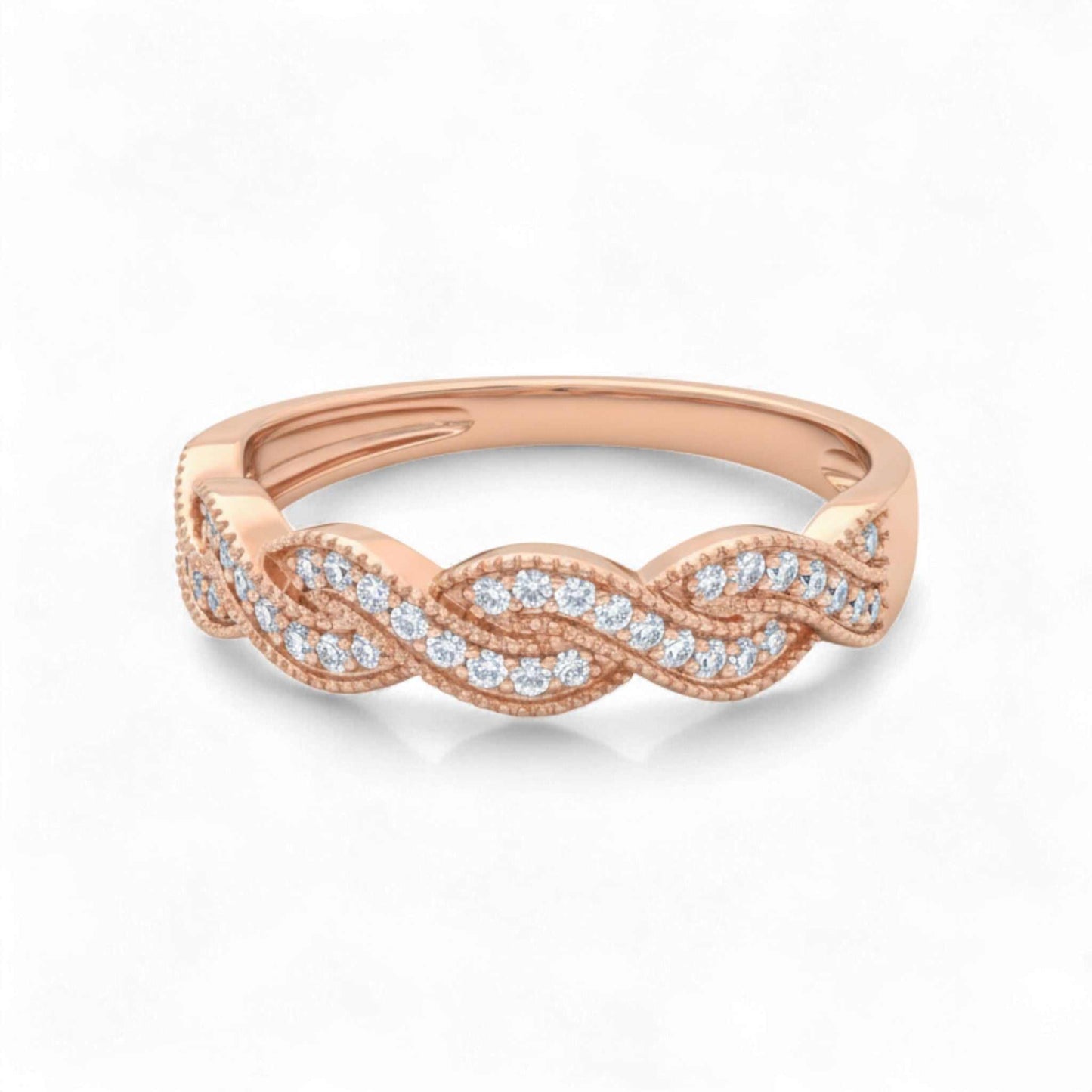 Makeda Oval CZ Band 10KT gold ring with oval-cut cubic zirconia stones in an elegant twisted design
