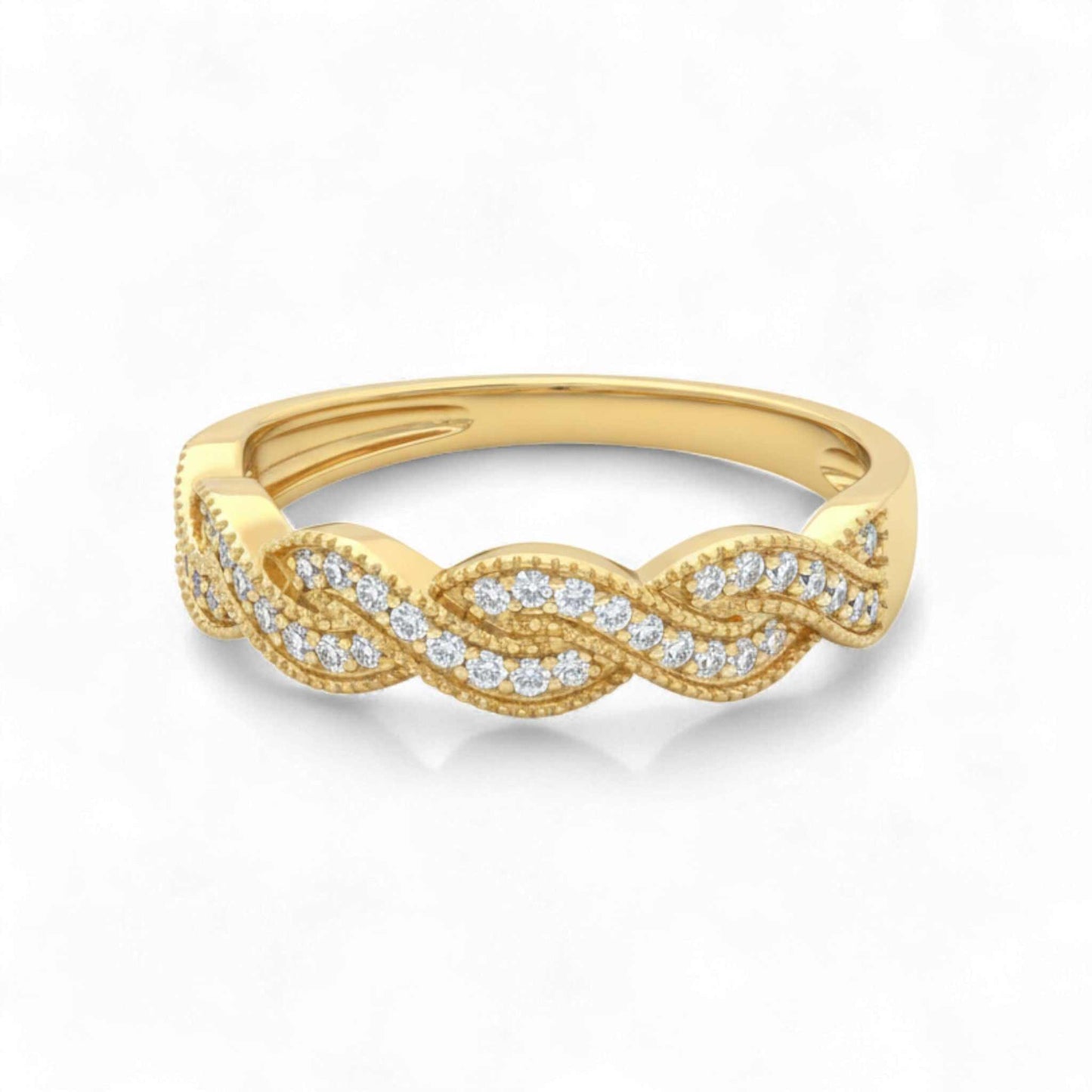 Gold ring with diamond accents on a white background