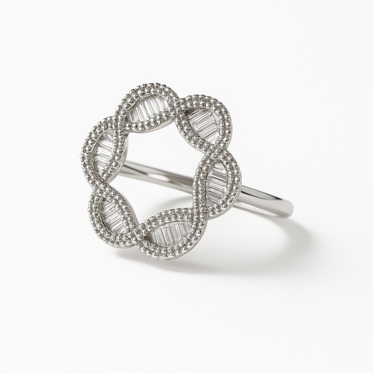 Silver ring with diamond accents on a white background