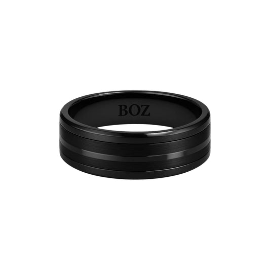 Midline black tungsten carbide band with matte finish and subtle groove detailing for men.
