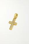 Gold cross pendant with embedded diamonds on a light gray background