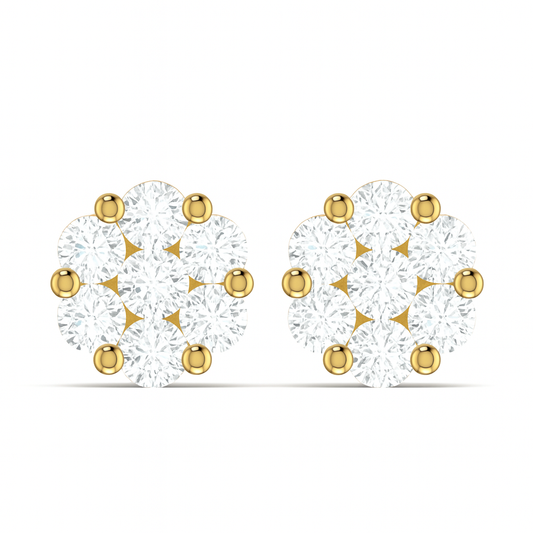 Gold and clear gemstone earrings on a white background