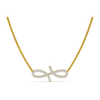 Gold necklace with a diamond-encrusted infinity pendant on a white background