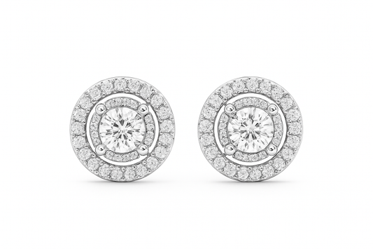 Pair of diamond earrings on a white background