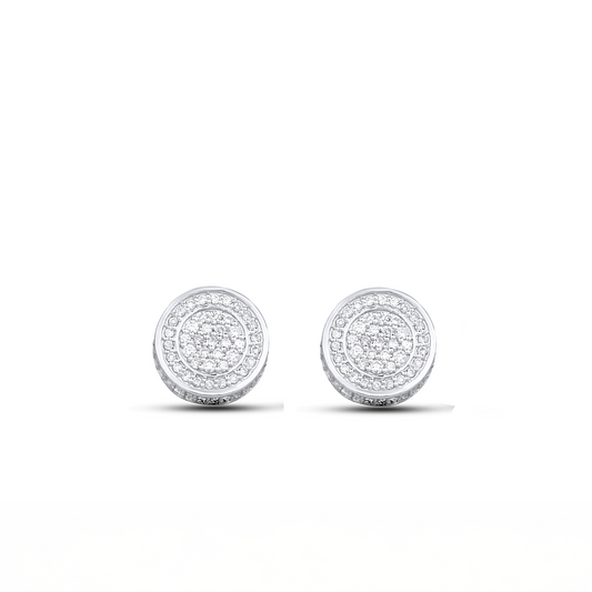 A pair of round diamond stud earrings in 18k gold, with visible diamond details and a glossy finish.