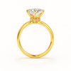 Gold ring with a diamond on a white background