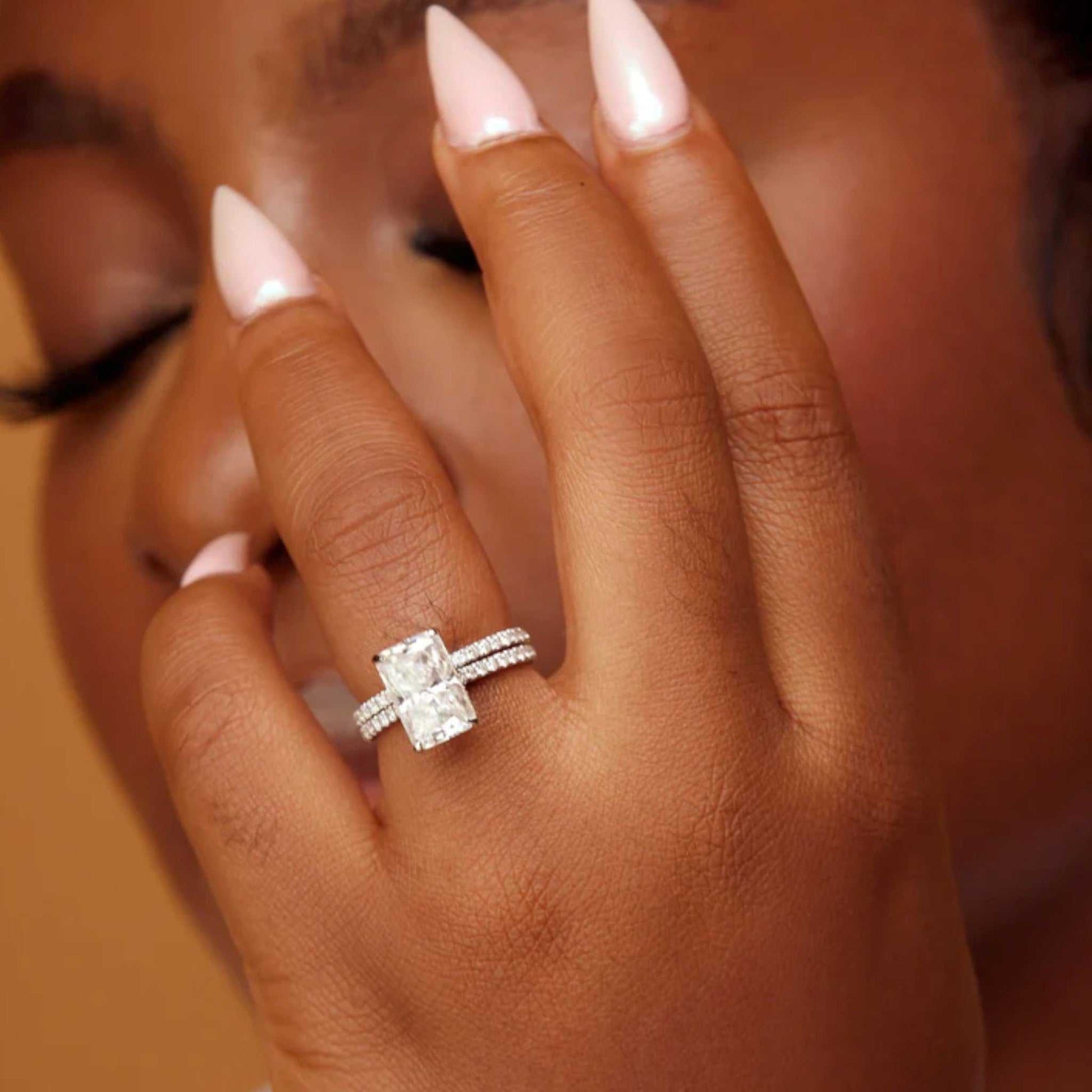 Simi Radiant Cut CZ Bride Set 925 Sterling Silver radiant-cut cubic zirconia ring and matching band on hand