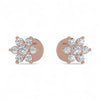 Rose gold earrings with diamond-like stones on a white background