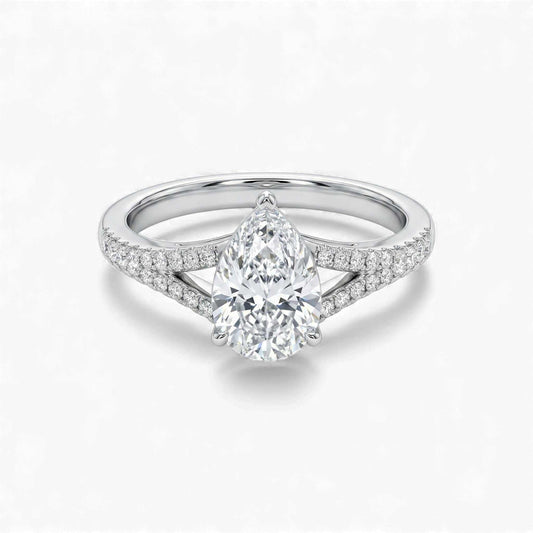 Split shank pear cut moissanite engagement ring in 925 sterling silver with pavé-set stones
