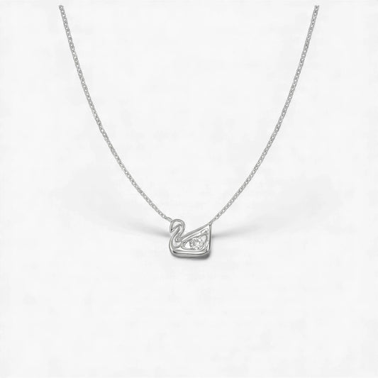 Silver swan pendant necklace on a white background